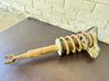 Front shock absorber with coil spring 
