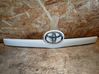 Trunk door license plate light bar 768110F060