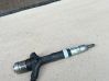 Inyector de combustible 236700G010