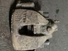 Caliper de freno delantero 
