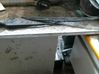 Front wiper blade arm 