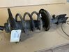 Front shock absorber with coil spring 00005208Q5