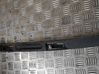 Trunk door license plate light bar 