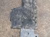 Center/middle under tray cover 