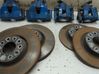 Brake discs and calipers set 93189696