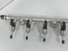 Inyector de combustible 05E133320