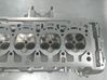 Engine head 06K103063AE