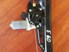 Front door window regulator with motor 130821459