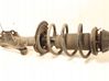 Front shock absorber with coil spring 