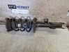 Front shock absorber with coil spring 