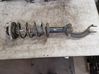 Front shock absorber with coil spring 
