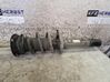 Front shock absorber with coil spring 
