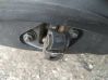 Front door check strap stopper 