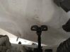 Front door check strap stopper 