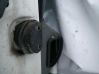 Front door check strap stopper 