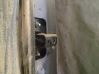Rear door check strap stopper 