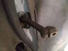 Rear door check strap stopper 
