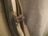 Front door check strap stopper 