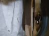 Front door check strap stopper 