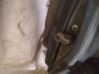 Rear door check strap stopper 