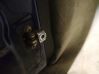Front door check strap stopper 