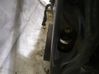 Front door check strap stopper 