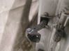 Front door check strap stopper 