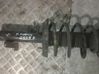 Front shock absorber with coil spring 
