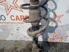 Front shock absorber with coil spring 