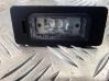 Trunk door license plate light bar 1090074