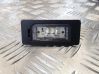 Trunk door license plate light bar 1090074