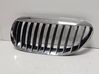 Front bumper upper radiator grill KM07031