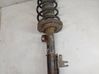 Front shock absorber with coil spring 
