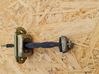 Front door check strap stopper 