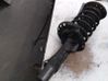 Front shock absorber with coil spring 