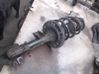 Front shock absorber with coil spring 