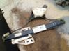 Rear window lifting mechanism without motor 