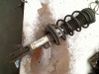 Front shock absorber with coil spring 