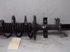 Front shock absorber with coil spring 543028406R