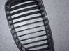 Front bumper upper radiator grill 7128613