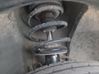 Front shock absorber with coil spring 