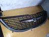 Front bumper upper radiator grill 4857522AA