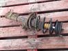 Front shock absorber with coil spring 