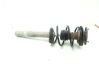Front shock absorber with coil spring 