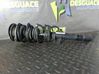 Front shock absorber with coil spring 