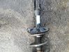 Front shock absorber with coil spring E4303CB025