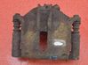 Caliper de freno delantero 