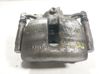 Caliper de freno delantero 8V0615124D