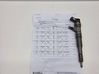 Fuel injector 7794435