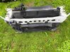 Radiator support slam panel 